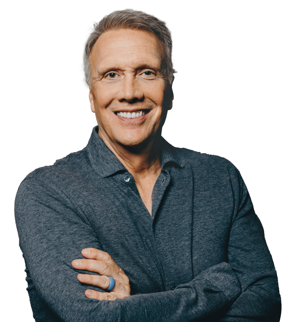 A picture of pastor of Ed Young crossing his arms